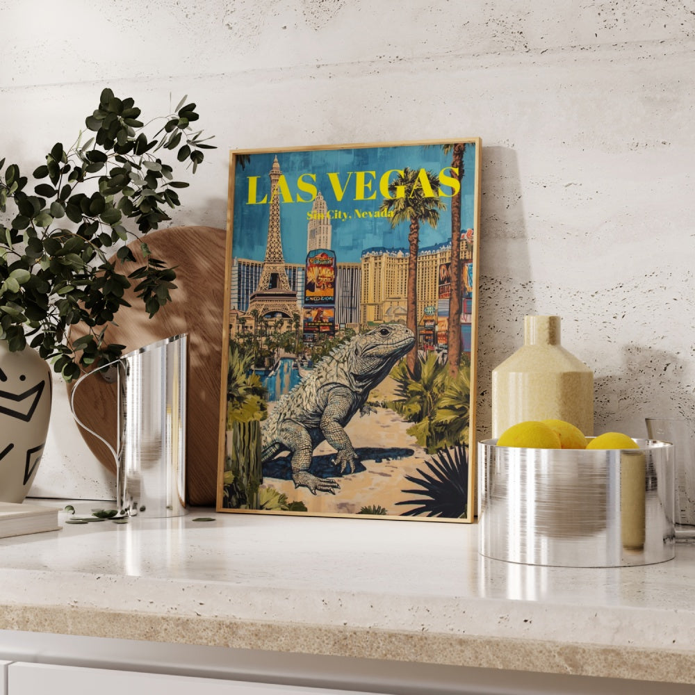 A vintage Las Vegas framed travel poster with a giant lizard in the middle of the Las Vegas Strip. 