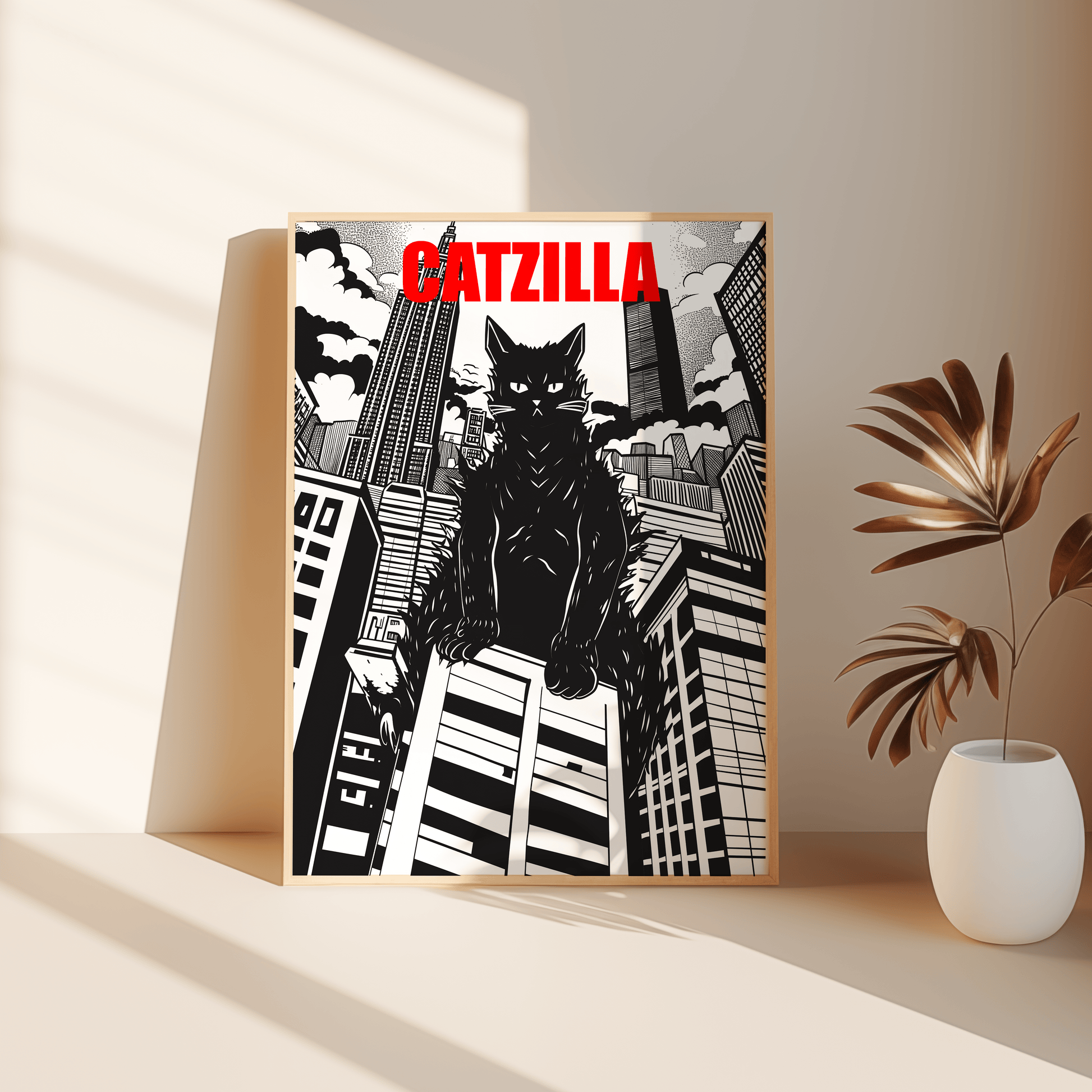 Framed poster of a manga Catzilla over large buildings, Black and White, leaning against the bedroom floor - Paw Prints