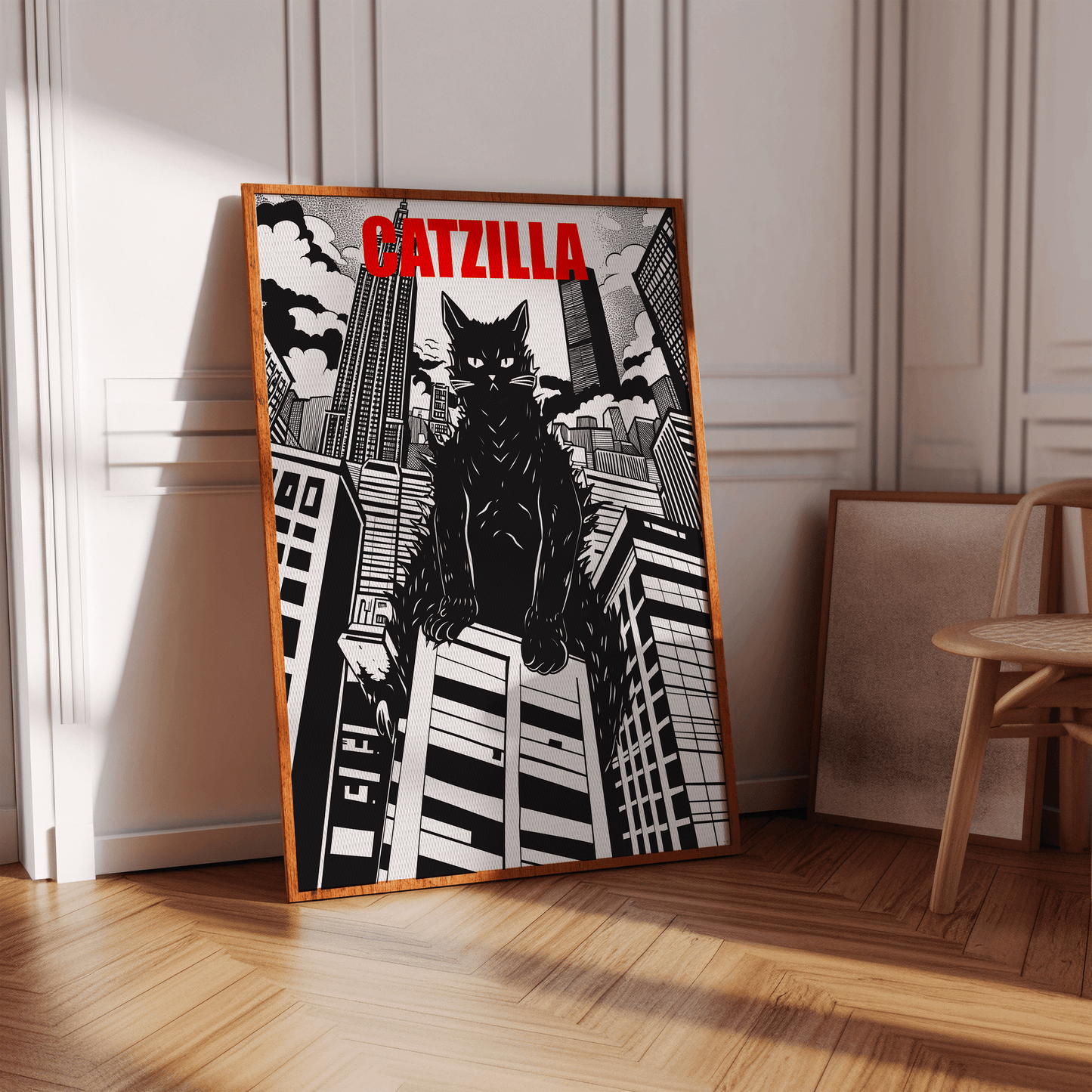 Framed poster of a manga depiction of Catzilla over large buildings, Black and White, in a hallway - Paw Prints