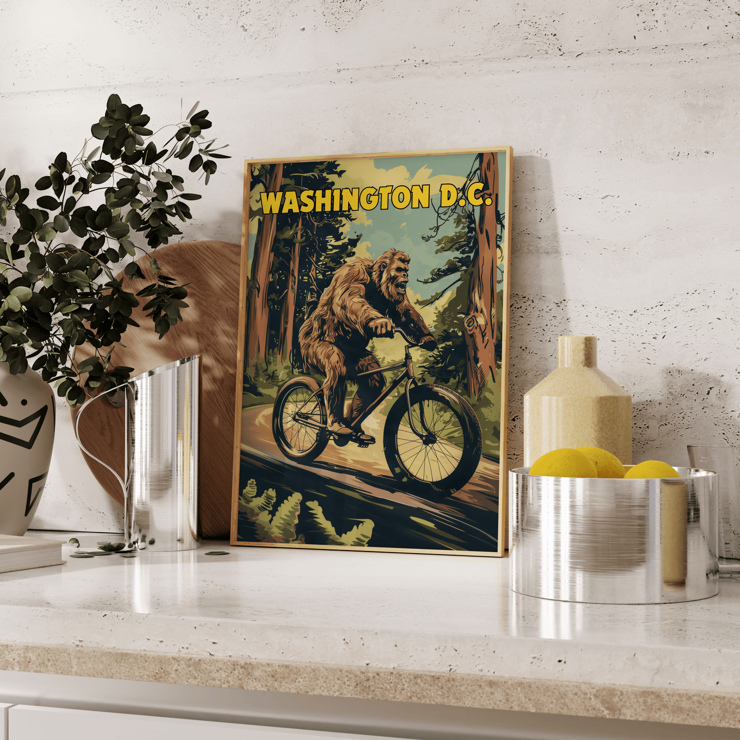 Travel Poster of a Bigfoot riding a bicycle through the forest, titled "Washington DC", leaning against the kitchen counter - Paw Prints